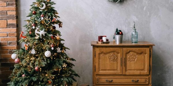 christmas tree with gifts and a table